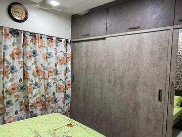 Bedroom in 2 BHK Apartment at Sai Dham CHS Kandivali, Kandivali West – for Rent