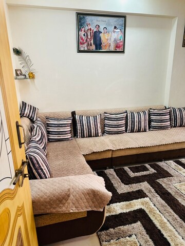 Living Room in 2 BHK Apartment at New Cg Road – for Sale