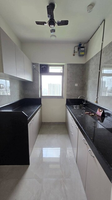 Kitchen in 1 BHK Apartment at Conwood Astoria, Goregaon East – for Rent