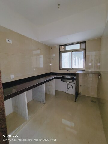 Kitchen in 2 BHK Apartment at Chandak Cornerstone, Worli – for Rent