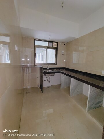 Kitchen in 2 BHK Apartment at Chandak Cornerstone, Worli – for Rent