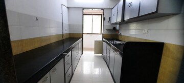 Kitchen in 2 BHK Apartment at Palash Towers, Andheri West – for Sale