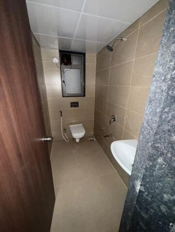 Bathroom in 2 BHK Apartment at Runwal Eirene, Balkum Pada – for Rent
