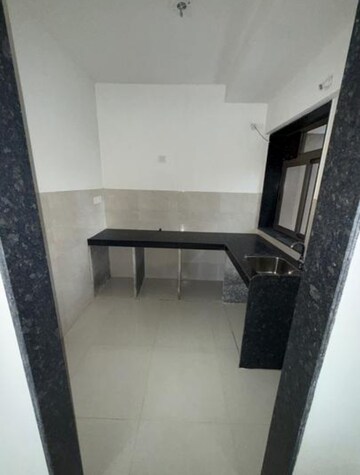 Kitchen in 2 BHK Apartment at Runwal Eirene, Balkum Pada – for Rent