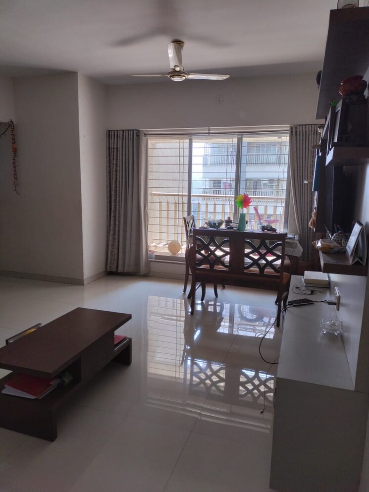 Living Room, unique-poonam-estate-cluster-3 3 Bedroom 838 Sq.Ft. Apartment In Mira Road Thane 9058249