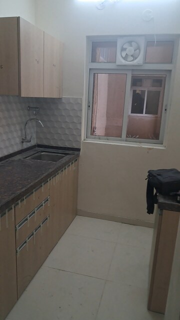 Kitchen in 1 BHK Builder Floor at Godrej Green Cove, Mahalunge – for Rent