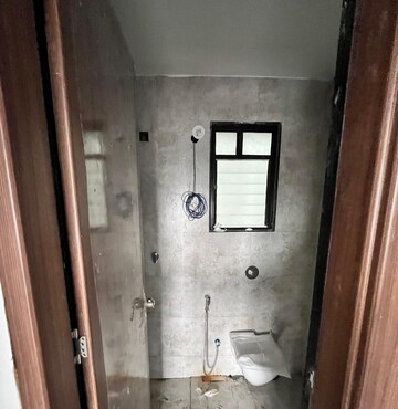 Bathroom in 3 BHK Apartment at Unique Youtopia, Kharadi – for Rent