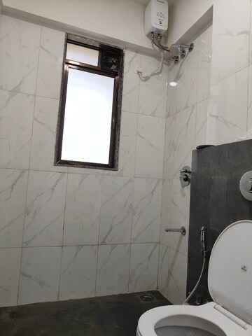 Bathroom in 2 BHK Apartment at Lotus Unity, Versova – for Rent