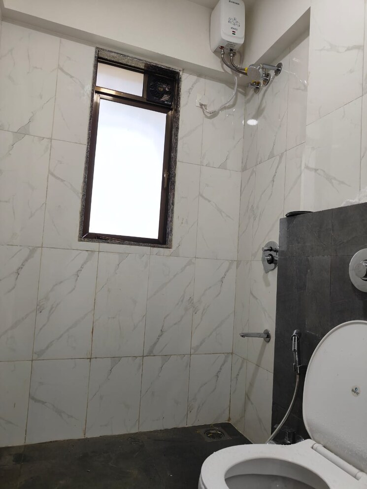 Bathroom, lotus-unity 2 Bedroom 735 Sq.Ft. Apartment In Versova Mumbai 9058548