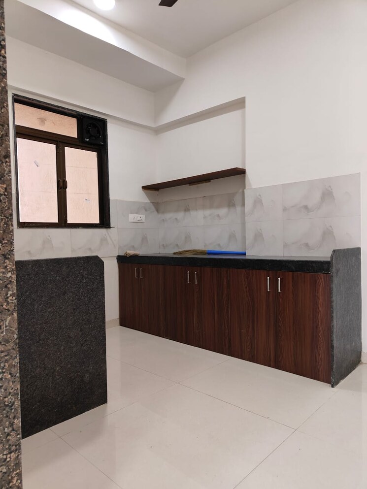 Kitchen, lotus-unity 2 Bedroom 735 Sq.Ft. Apartment In Versova Mumbai 9058548