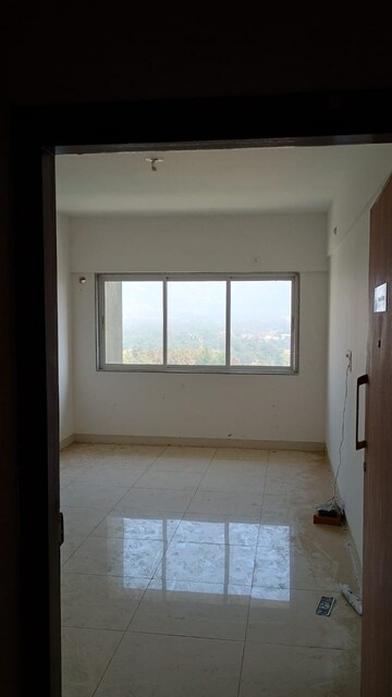 Room in 1 BHK Apartment at Godrej City, Poyanje – for Sale