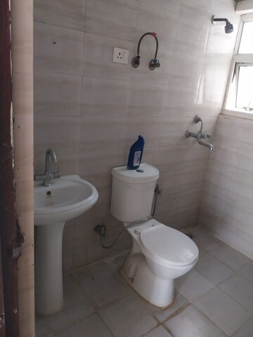 Bathroom in 3 BHK Apartment at Panchsheel Greens, Sector 16 Greater Noida – for Rent