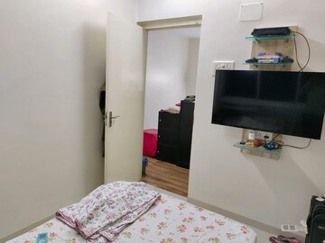 Bedroom in 4 BHK Apartment at Nandkutir CHS, Kopar Khairane – for Sale