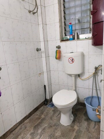 Bathroom in 4 BHK Apartment at Nandkutir CHS, Kopar Khairane – for Sale