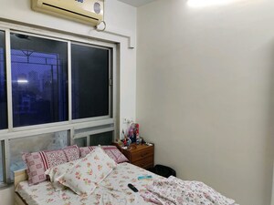 Bedroom in 4 BHK Apartment at Nandkutir CHS, Kopar Khairane – for Sale