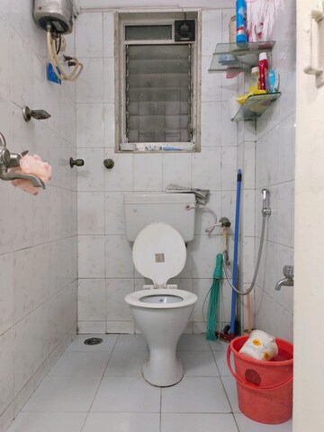 Bathroom in 4 BHK Apartment at Nandkutir CHS, Kopar Khairane – for Sale