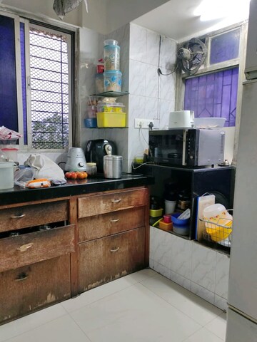 Kitchen in 4 BHK Apartment at Nandkutir CHS, Kopar Khairane – for Sale