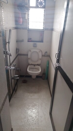 Bathroom in 1 BHK Apartment at Thakur Gayatri Satsang, Kandivali East – for Sale