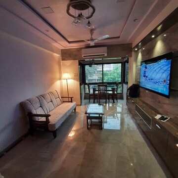 Living Room in 1 BHK Apartment at Manoday CHS, Borivali East – for Rent