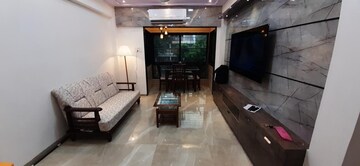Living Room in 1 BHK Apartment at Manoday CHS, Borivali East – for Rent
