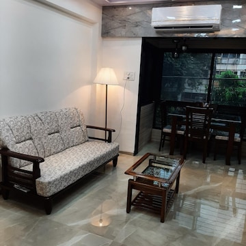 Living Room in 1 BHK Apartment at Manoday CHS, Borivali East – for Rent