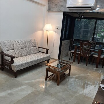 Living Room in 1 BHK Apartment at Manoday CHS, Borivali East – for Rent