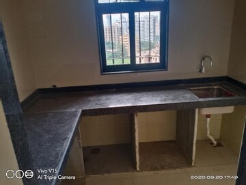 Kitchen in 1 BHK Apartment at Dosti Desire Joy, Brahmand – for Sale