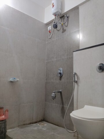 Bathroom in 3 BHK Apartment at Mantra Insignia, Mundhwa – for Rent