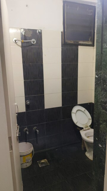 Bathroom in 2 BHK Apartment at Sahaj Solarium, Vasna – for Rent