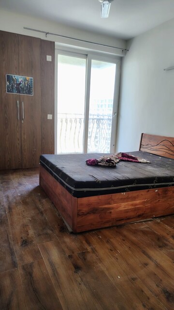 Bedroom in 3 BHK Apartment at Nimbus The Golden Palm, Sector 168 – for Rent