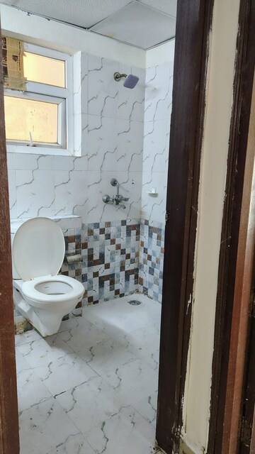 Bathroom in 3 BHK Apartment at Nimbus The Golden Palm, Sector 168 – for Rent