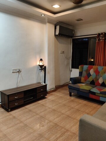 Living Room in 2 BHK Apartment at Sandeep Sagar CHS, Santacruz East – for Rent