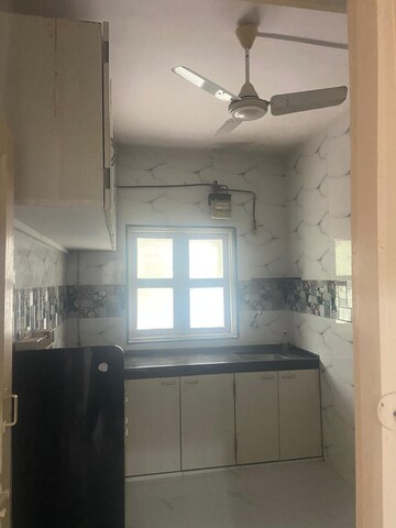 Kitchen in 2 BHK Apartment at Vasundhara CHS Gokuldham, Gokuldham Colony – for Rent