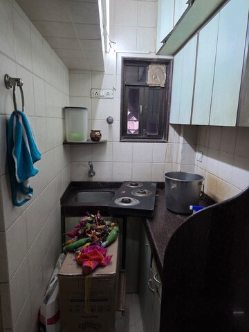 Kitchen in 1.5 BHK Apartment at Koteshwar Palace, Andheri East – for Rent