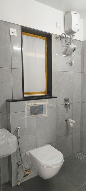 Bathroom in 2 BHK Apartment at Grant Road – for Sale