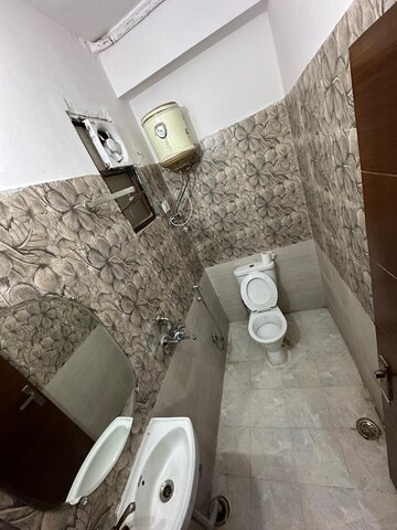 Bathroom in 2 BHK Apartment at Mahagun Moderne, Sector 78 – for Rent