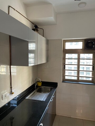 Kitchen in 2 BHK Apartment at Sheth Vasant Oasis, Andheri East – for Rent