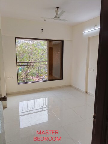 Room in 2 BHK Apartment at Kamla Sukhshanti, Kandivali West – for Sale