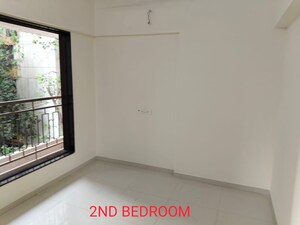 Room in 2 BHK Apartment at Kamla Sukhshanti, Kandivali West – for Sale
