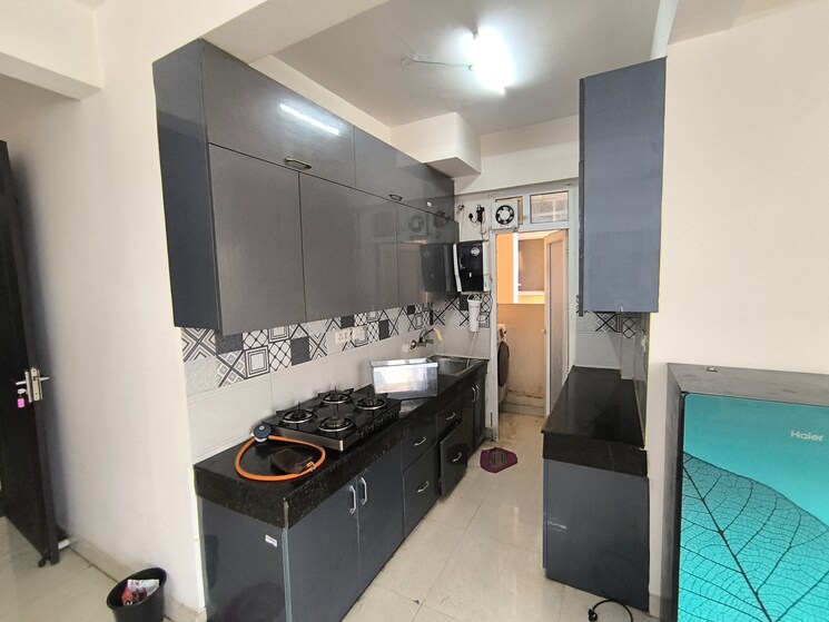 Kitchen, signature-the-serenas 1.5 Bedroom 483 Sq.Ft. Apartment In Sohna Sector 36 Gurgaon 9059174