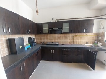 Kitchen in 3 BHK Apartment at Mahagun Mywoods III, Sector 16c Greater Noida – for Rent