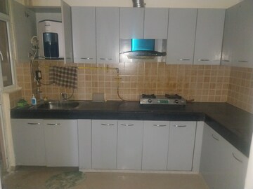 Kitchen in 3 BHK Apartment at Mahagun Mywoods II, Sector 16c Greater Noida – for Rent