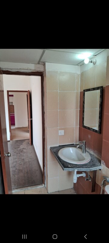 Bathroom in 2.5 BHK Apartment at Mahagun Mywoods II, Sector 16c Greater Noida – for Rent