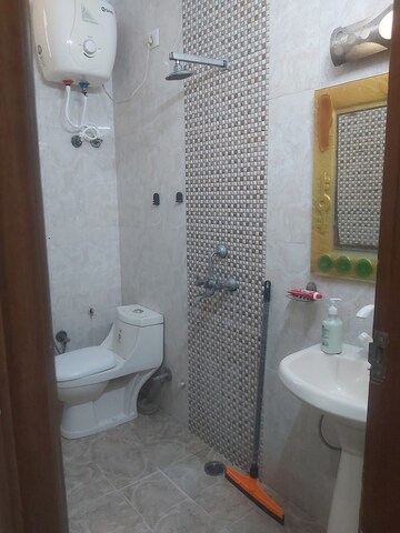 Bathroom in 2 BHK Builder Floor at Chaudhary Deshraj Complex, Sector 22 – for Rent