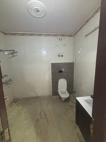 Bathroom in 2 BHK Builder Floor at Arsh Eco Home, Gaur City 1 – for Rent