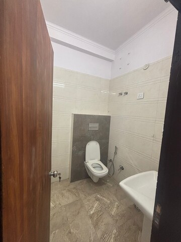 Bathroom in 2 BHK Builder Floor at Arsh Eco Home, Gaur City 1 – for Rent