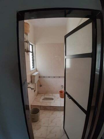 Bathroom in 1 BHK Apartment at Dhiraj Building, Andheri East – for Rent