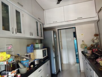Kitchen in 2 BHK Apartment at Chaurang CHS, Sanpada – for Rent