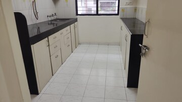 Kitchen in 2 BHK Apartment at Landmark Garden, Kalyani Nagar – for Rent