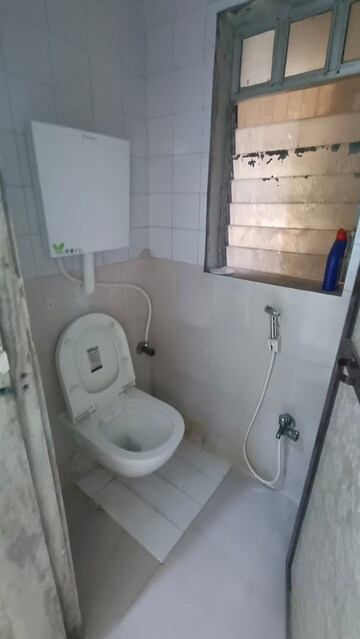 Bathroom in 1 BHK Apartment at Highland Residency CHSL, Balkum Pada – for Rent
